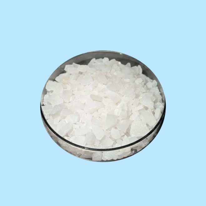 A close-up view of pure Aluminum Sulphate (solid) crystals, essential for effective water treatment.