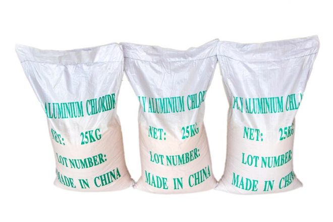 3 bags of Polyaluminum Chloride (PAC) used for water treatment applications.